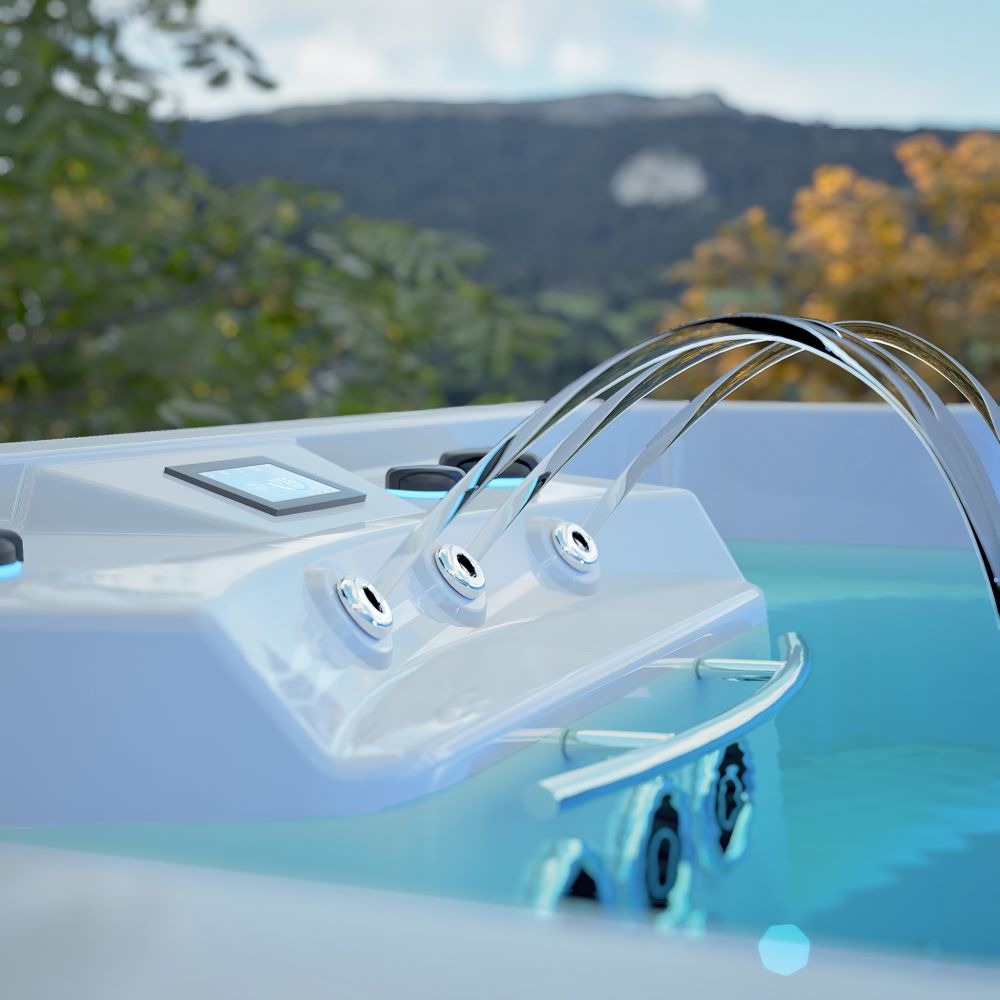 Panel sterowania i dysze w nowoczesnym jacuzzi z widokiem na góry.