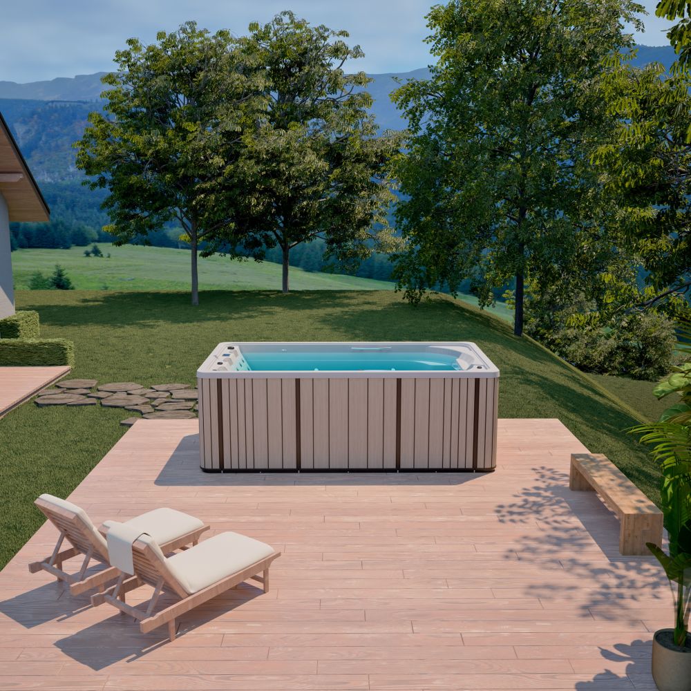 Wanna zewnętrzna z hydromasażem na drewnianym tarasie z widokiem na góry i ogród.