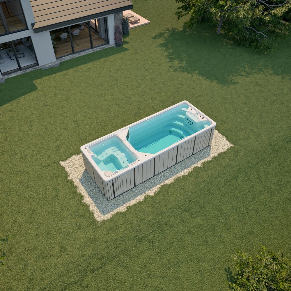 Basen ogrodowy z hydromasażem ustawiony na trawniku przy domu.