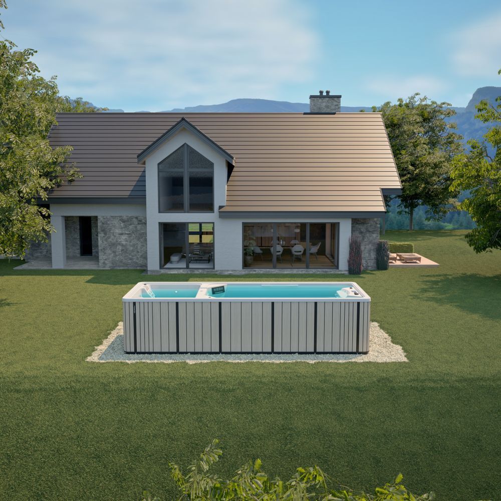 Nowoczesny dom z ogrodem i basenem typu swim spa na trawniku.