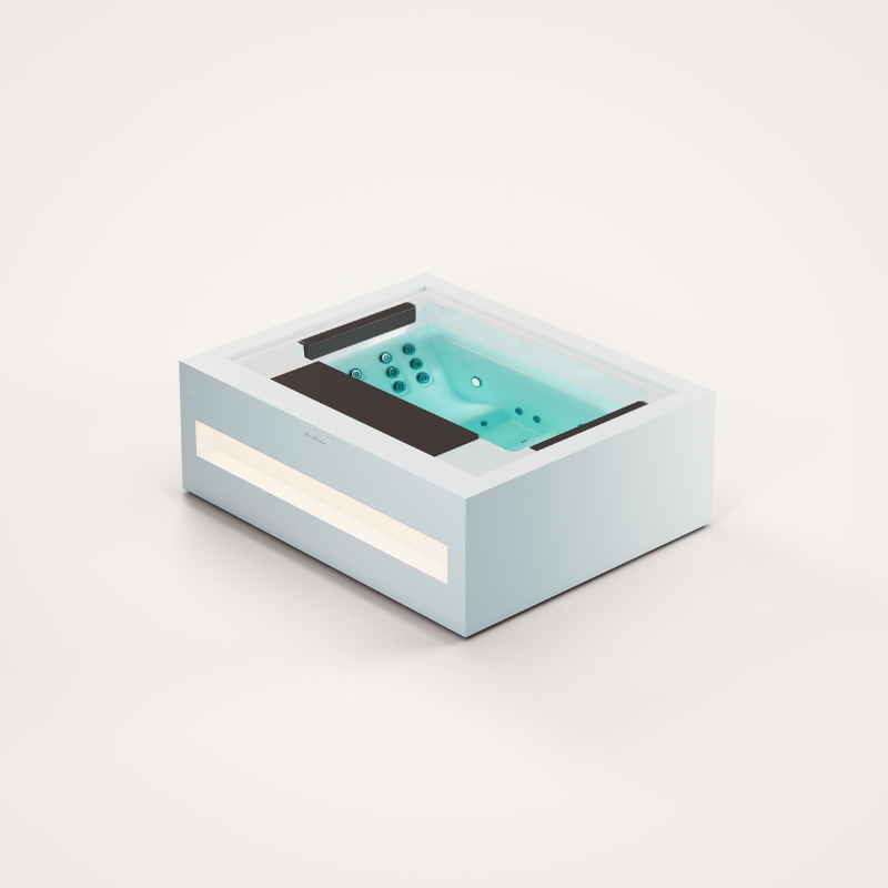 Nowoczesna prostokątna wanna z hydromasażem i podświetleniem LED na jasnym tle.