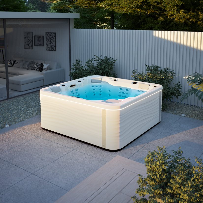 Nowoczesne jacuzzi z podświetleniem na tarasie obok przeszklonego salonu.