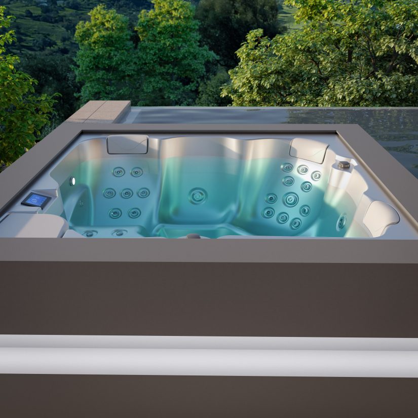 Nowoczesne jacuzzi z podświetlaną wodą i dyszami masującymi na tarasie z widokiem na zieleń.