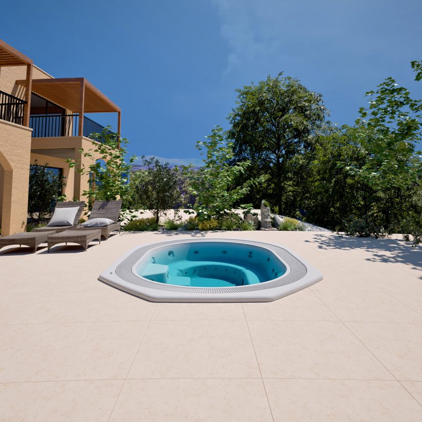 Okrągłe jacuzzi na słonecznym tarasie przy nowoczesnej willi z leżakami.