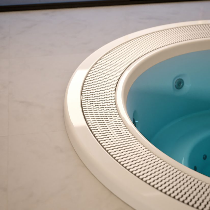 Krawędź okrągłego jacuzzi z niebieską wodą wbudowanego w marmurową podłogę.