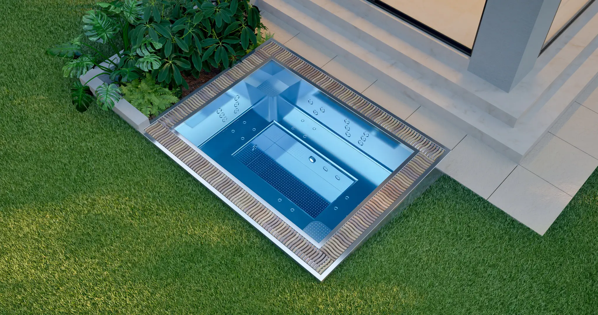 Nowoczesne jacuzzi wbudowane w taras w ogrodzie, obok domu.