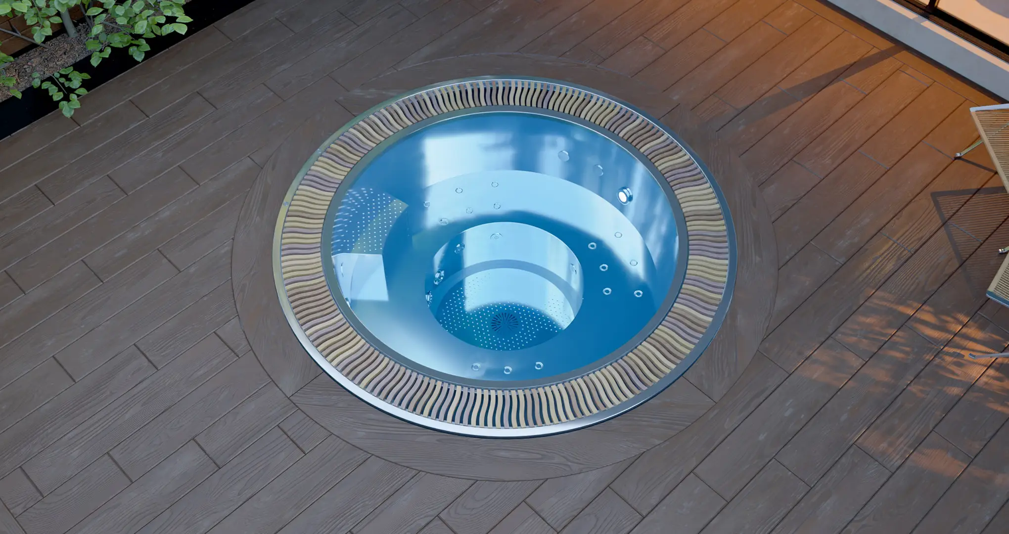 Okrągłe jacuzzi wbudowane w drewniany taras.